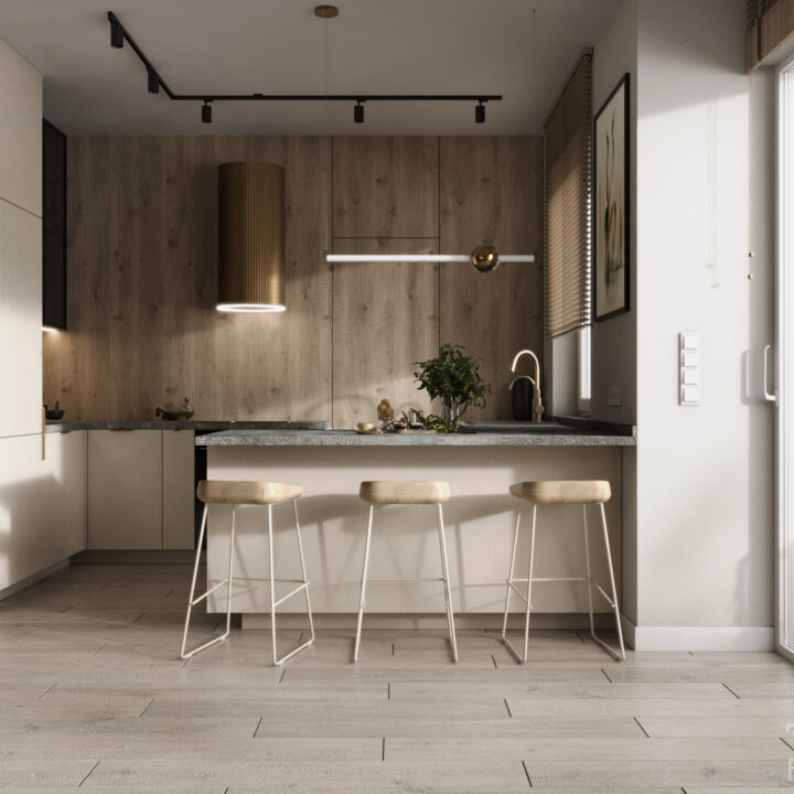 Kuchnia z wyspą – jasna zabudowa, drewniany blat i hoker w nowoczesnym wnętrz
