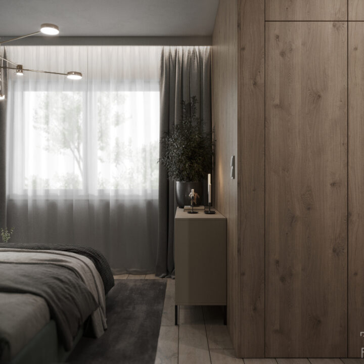 Sypialnia główna – zielona ściana akcentowa i tapicerowane łóżko