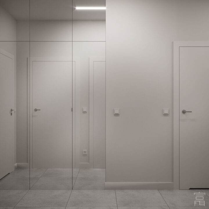 Hol wejściowy z zabudową z lustrami na wymiar, jasna kolorystyka i minimalistyczne podziały ścian