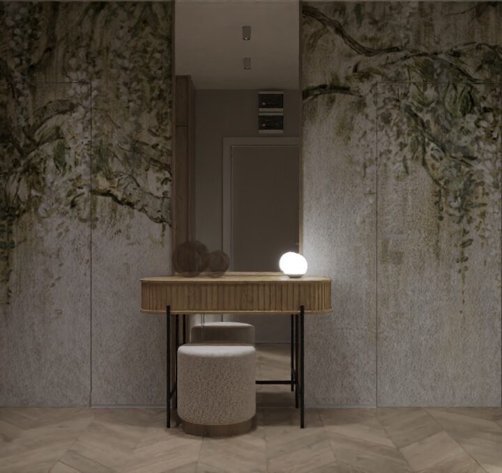 Projekt wnętrz mieszkania w Siedlcach został oparty na prostym, czytelnym układzie przestrzennym oraz konsekwentnej pracy materiałem i światłem. Bazą aranżacji są jasne tony, naturalne drewno oraz stonowana paleta szarości i beżu, które porządkują przestrzeń i budują spokojne tło dla codziennego życia. Strefa dzienna została zaprojektowana jako otwarta, ale wyraźnie zdefiniowana — kuchnia, jadalnia i salon przenikają się płynnie, zachowując funkcjonalną niezależność. Zabudowy meblowe pełnią rolę elementów architektonicznych: porządkują proporcje wnętrza i wprowadzają rytm bez wizualnego ciężaru. Część prywatna mieszkania utrzymana jest w tej samej, spójnej estetyce. Minimalistyczne formy, ograniczona liczba materiałów oraz precyzyjnie zaplanowane detale pozwalają skupić się na jakości przestrzeni, a nie na dekoracyjności. Całość tworzy wnętrze ponadczasowe — neutralne, ale wyraziste w swojej prostocie.