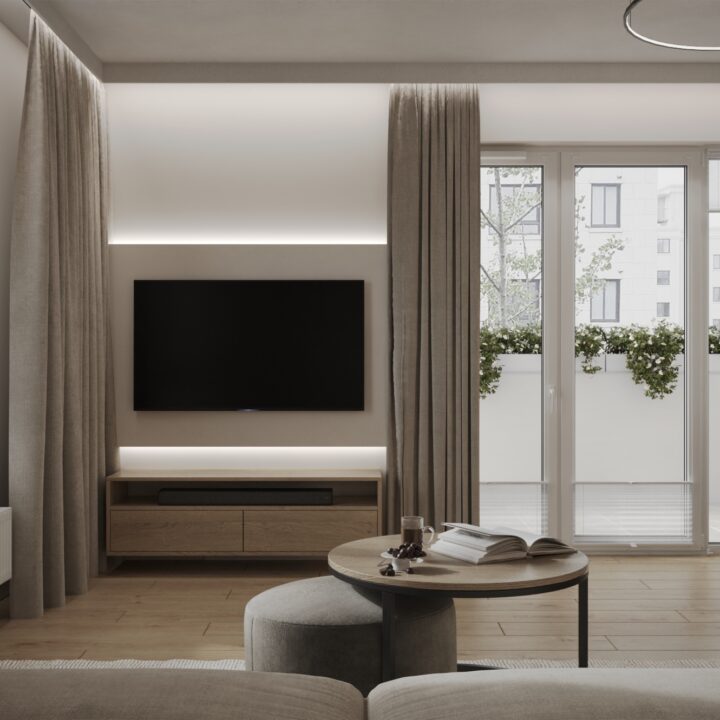 Salon z sofą i strefą wypoczynkową, jasne wnętrze o spójnej architekturze