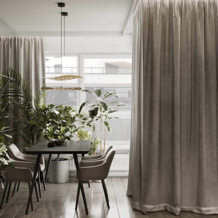 Jadalnia z drewnianym stołem, część dzienna mieszkania na Sadach Żoliborskich, naturalne światło i stonowane barwy