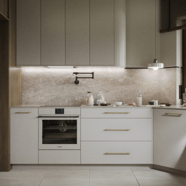 Kuchnia z zabudową na wymiar, spójna aranżacja strefy dziennej domu jednorodzinnego