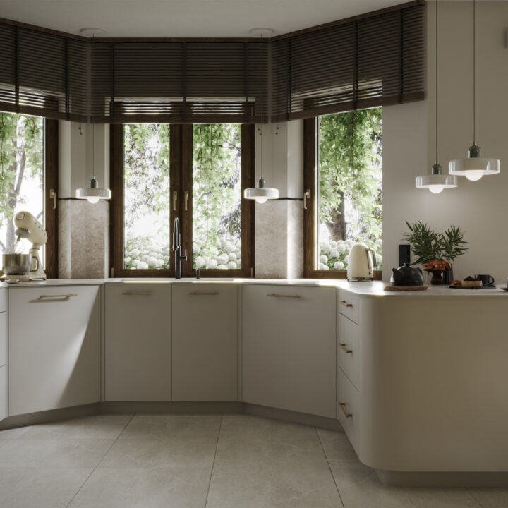 Strefa robocza kuchni z jasnymi frontami i kamiennym blatem, funkcjonalny układ wnętrza